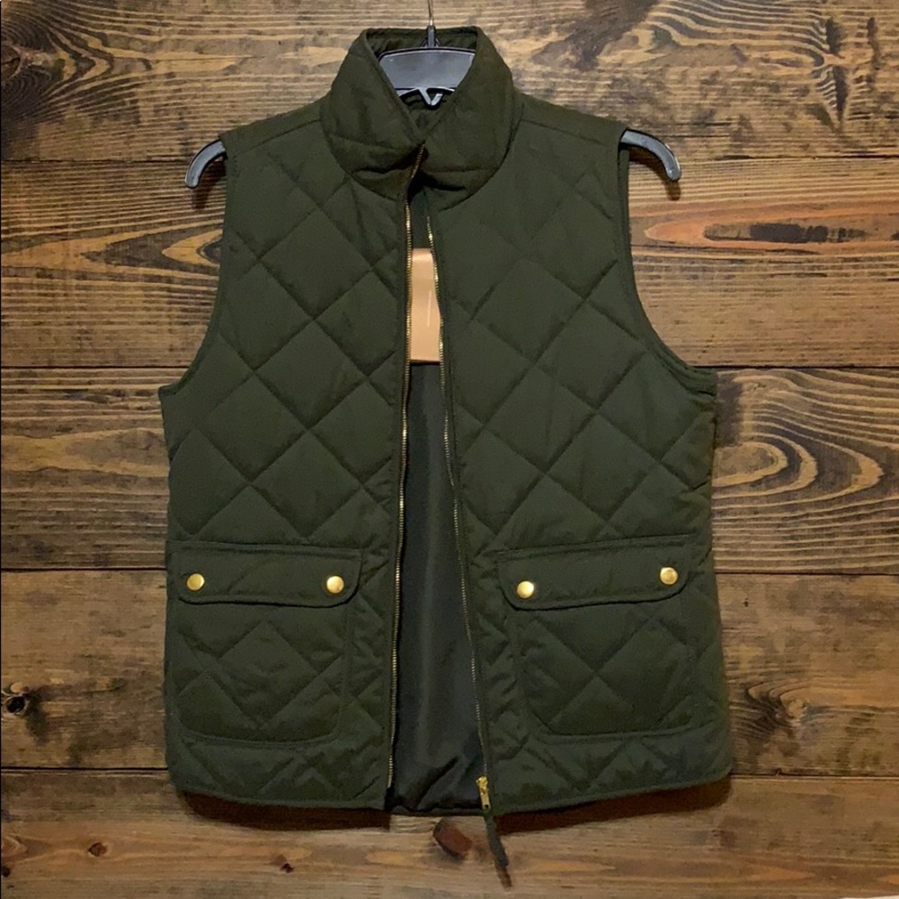 Dark green puffer vest